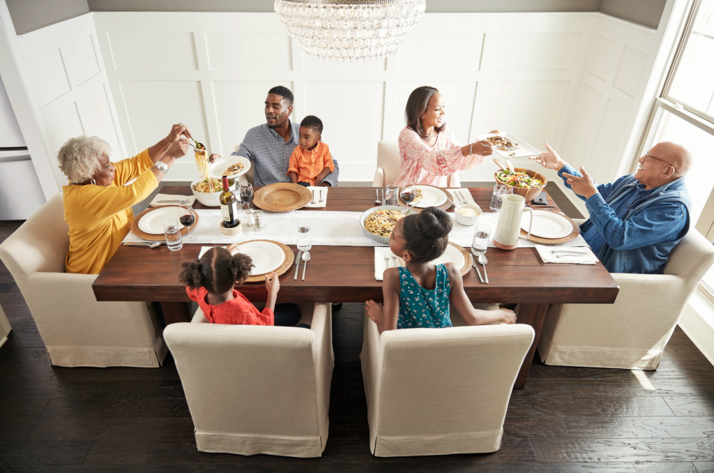 Happy family enjoying break fast | Haley's Flooring & Interiors