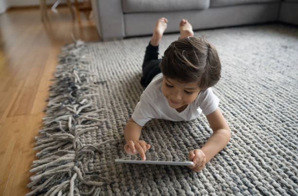 Girl lying on rug | Haley's Flooring & Interiors